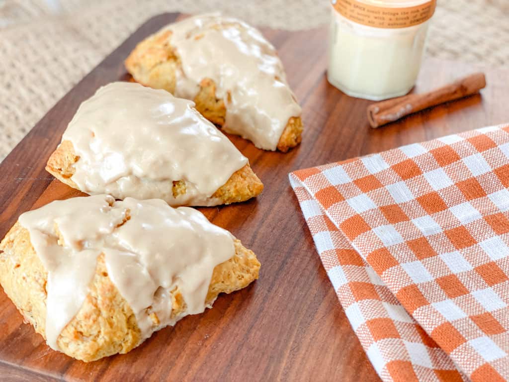 pumpkin sourdough scones on a bread board