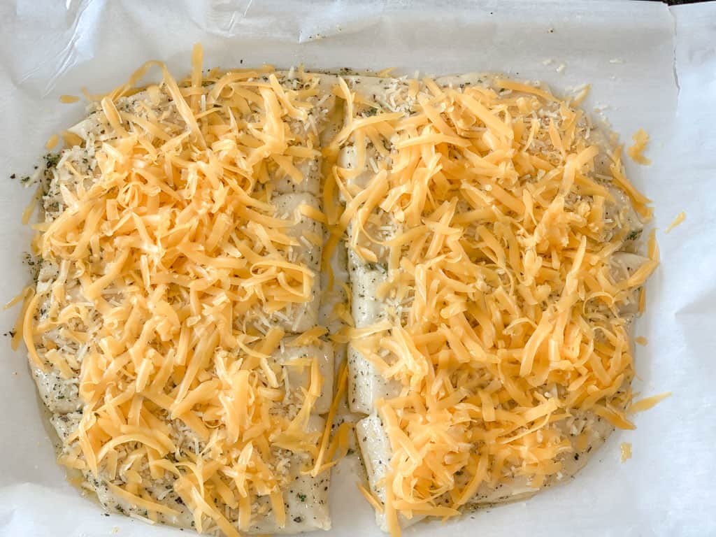 sourdough brushed with garlic butter and topped with parmesan and cheddar cheese